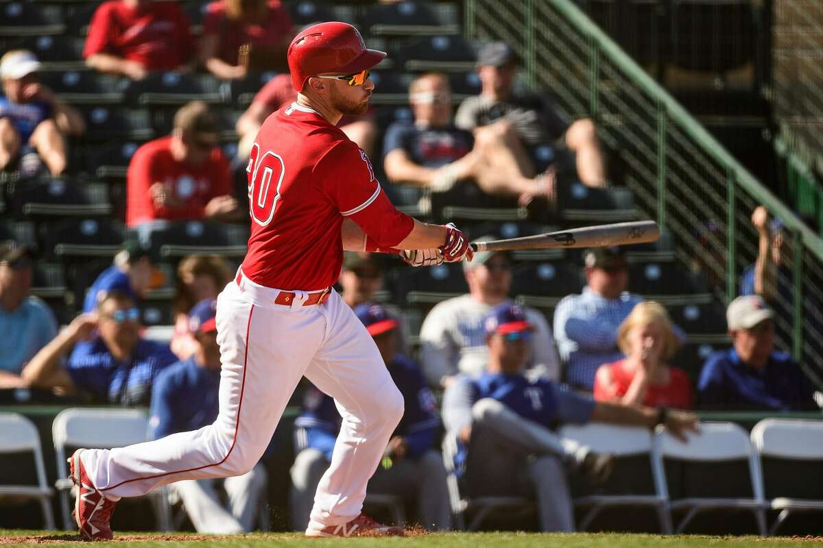 TEMPE, ARIZONA - FEBRUARY 28: Jonathan Lucroy #20 of the Los Angeles Angels singles against the Texas Rangers during the spring training game at Tempe Diablo Stadium on February 28, 2019 in Tempe, Arizona. (Photo by Jennifer Stewart/Getty Images)
