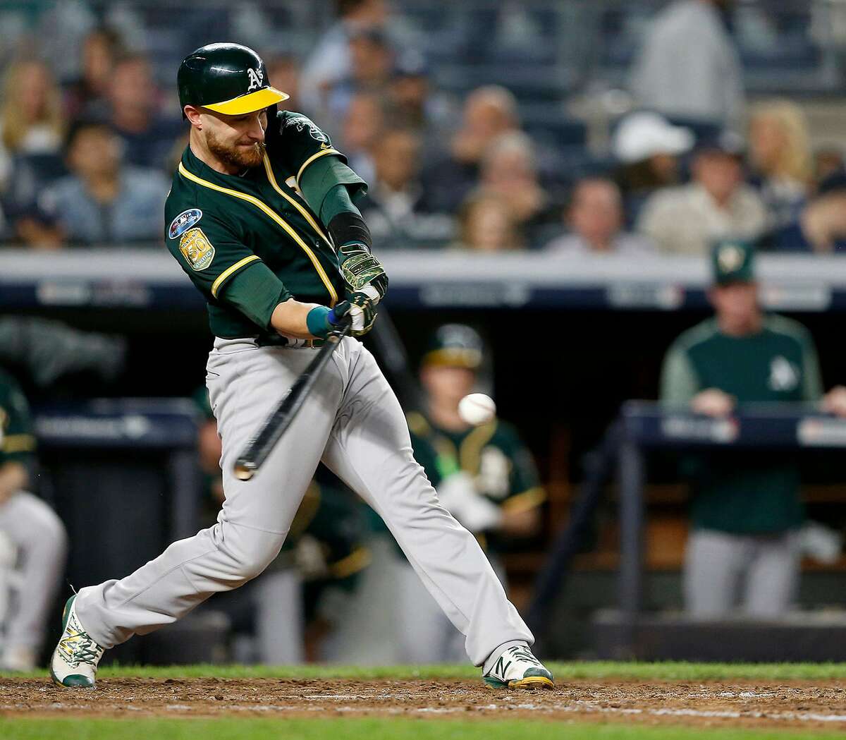 The Oakland Athletics' Jonathan Lucroy hits a single against the New York Yankees in the American League Wild Card game at Yankee Stadium in New York on October 3, 2018. Lucroy inked a one-year deal with the Los Angeles Angeles for the 2019 season. (Jane Tyska/Bay Area News Group/TNS)