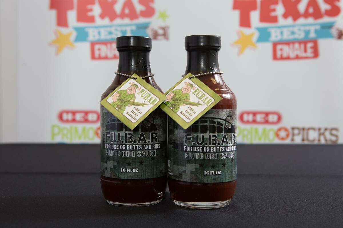 Bottles of Fubar barbecue sauce. The brand name, an acronym of "For Use on Butts and Ribs," also has a more derogatory meaning dating to WWII.