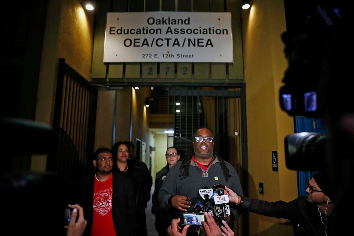 Oakland Education Association President Keith Brown announces that teachers have ratified agreement to return to classroom in Oakland, Calif., on Sunday, March 3, 2019.