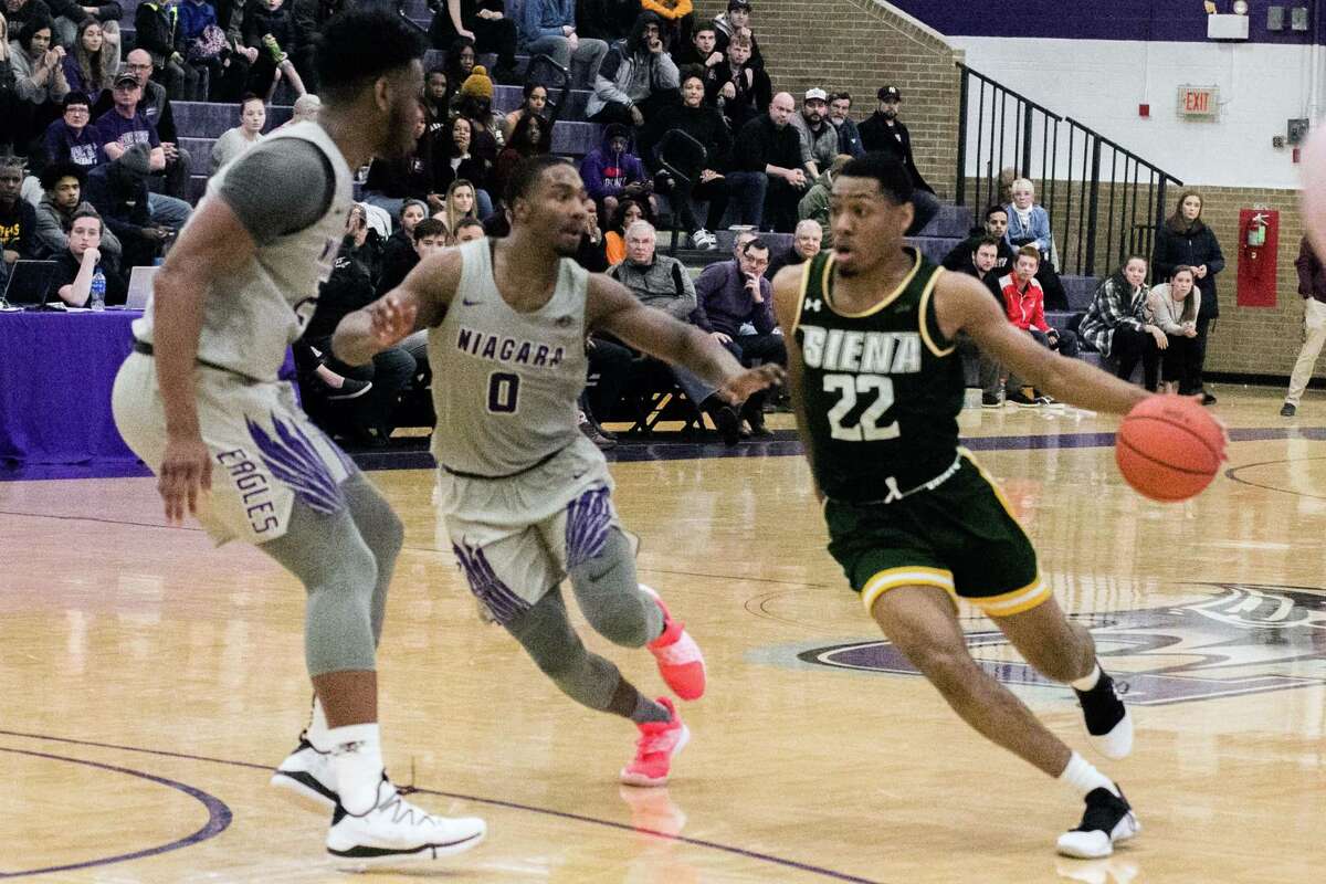 Siena's Jalen Pickett dribbles the ball Niagara players during a basketball game at the Gallagher Center on Sunday, March 3, 2019 in Lewiston, N.Y. (Paul Battson/Special to the Times Union)