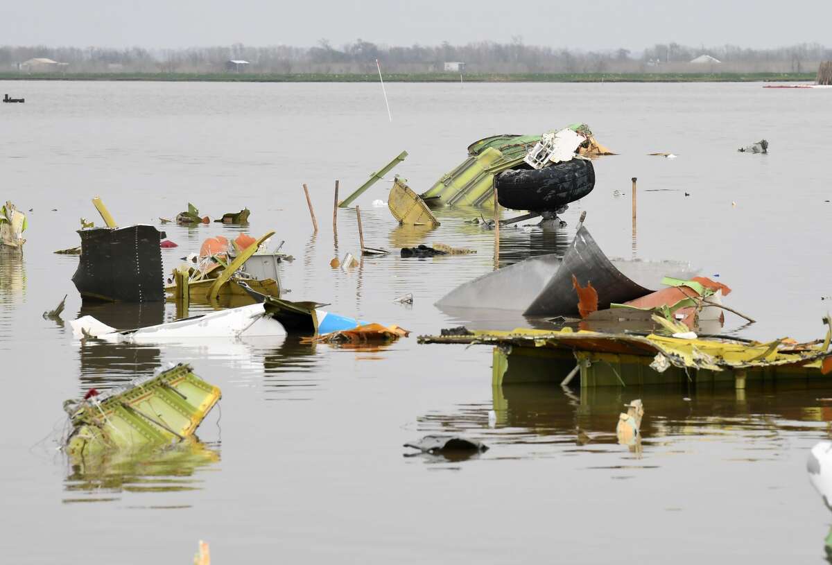 Debris from the cargo jet that crashed into Trinity Bay near Anahuac is scattered across the waters on Friday. The jet's black box was recovered Friday afternoon. Photo taken Friday, 3/1/19