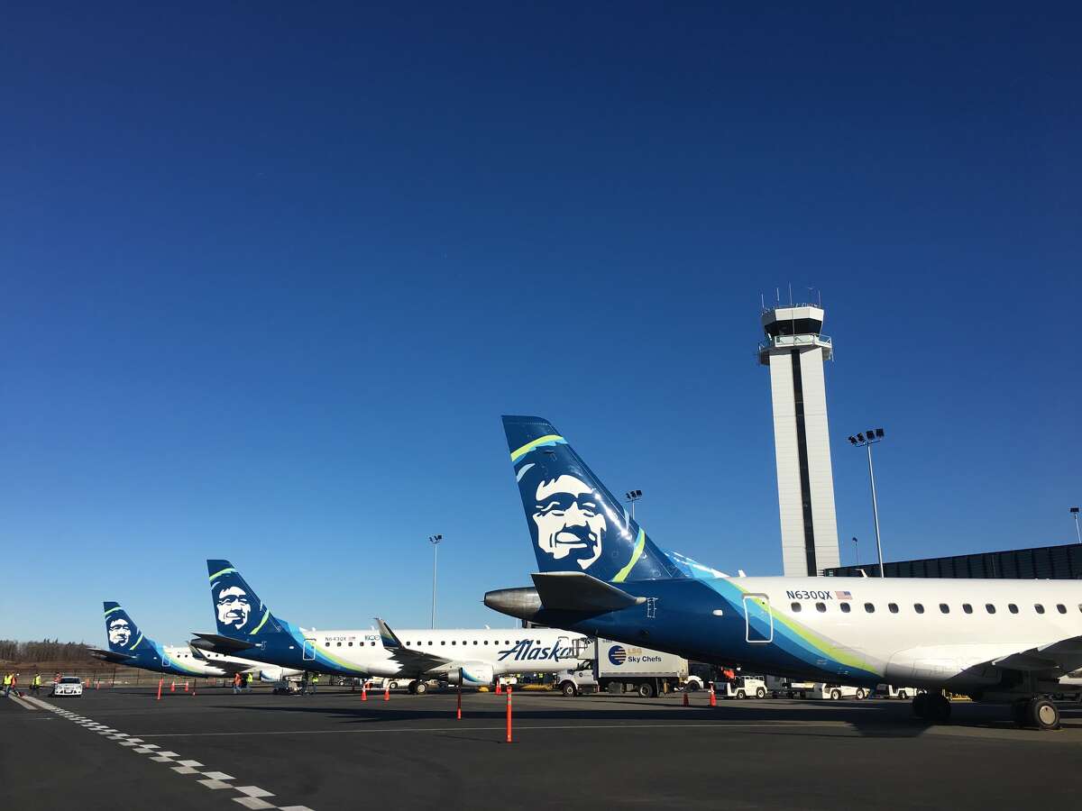 Three Alaska Airlines planes lined up for service to begin out of a new passenger terminal at Paine Field in Everett on Monday, March 4, 2019.