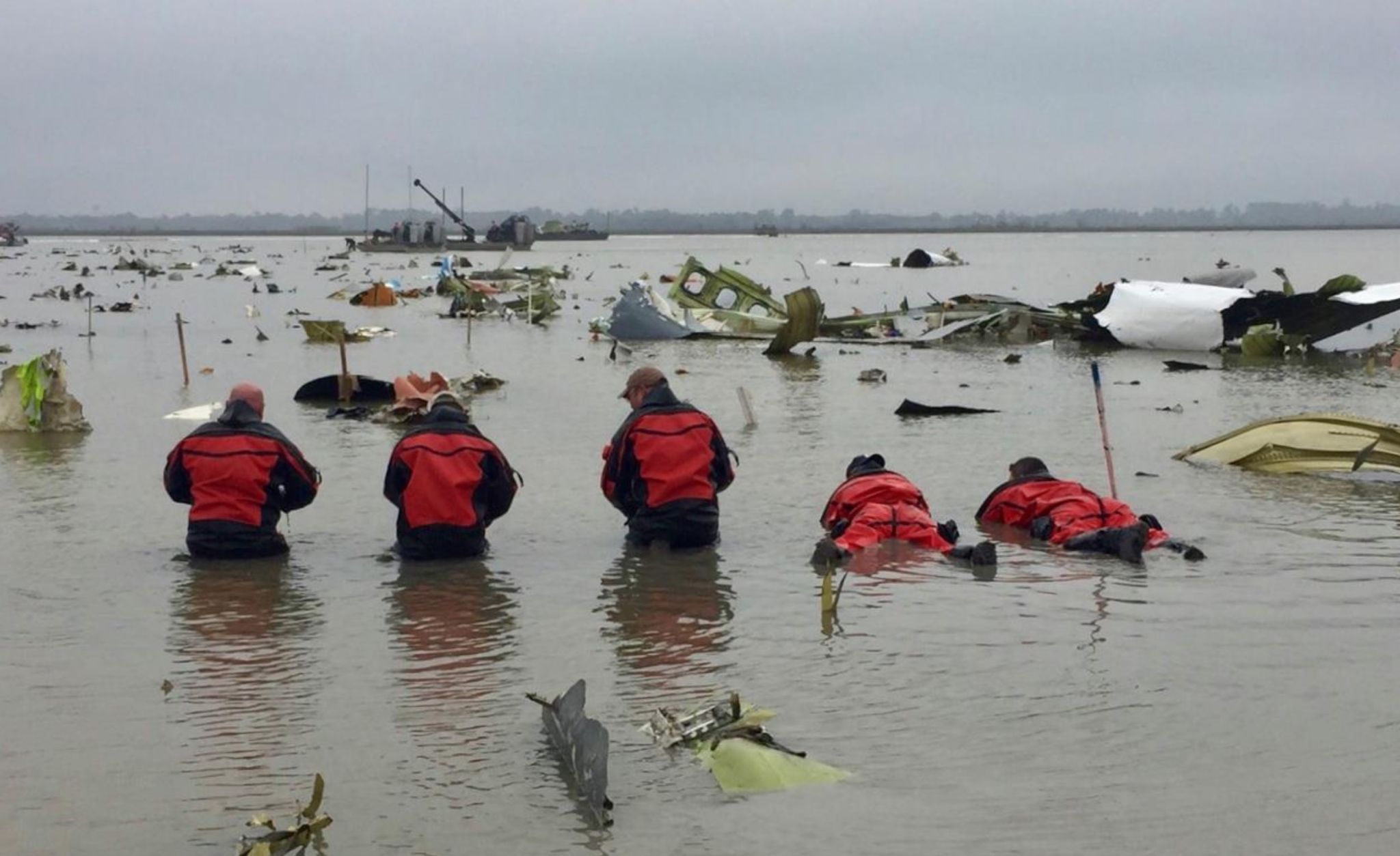 Photos show aftermath of Boeing 767 cargo plane's nose dive into Trinity Bay