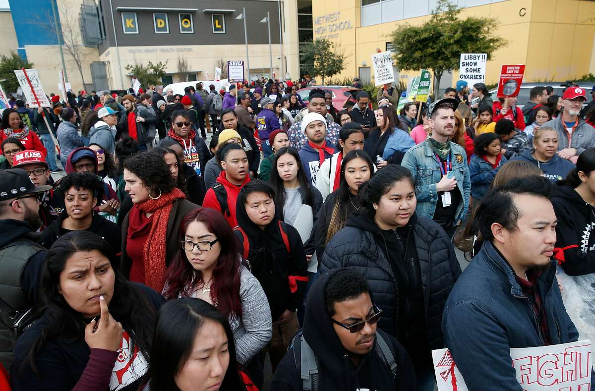 School teachers, students and parents continue to picket in front La Escuelita Elementary and Metwest High schools despite a tentative agreement that has been reached in the teachers strike in Oakland, Calif. on Friday, March 1, 2019.