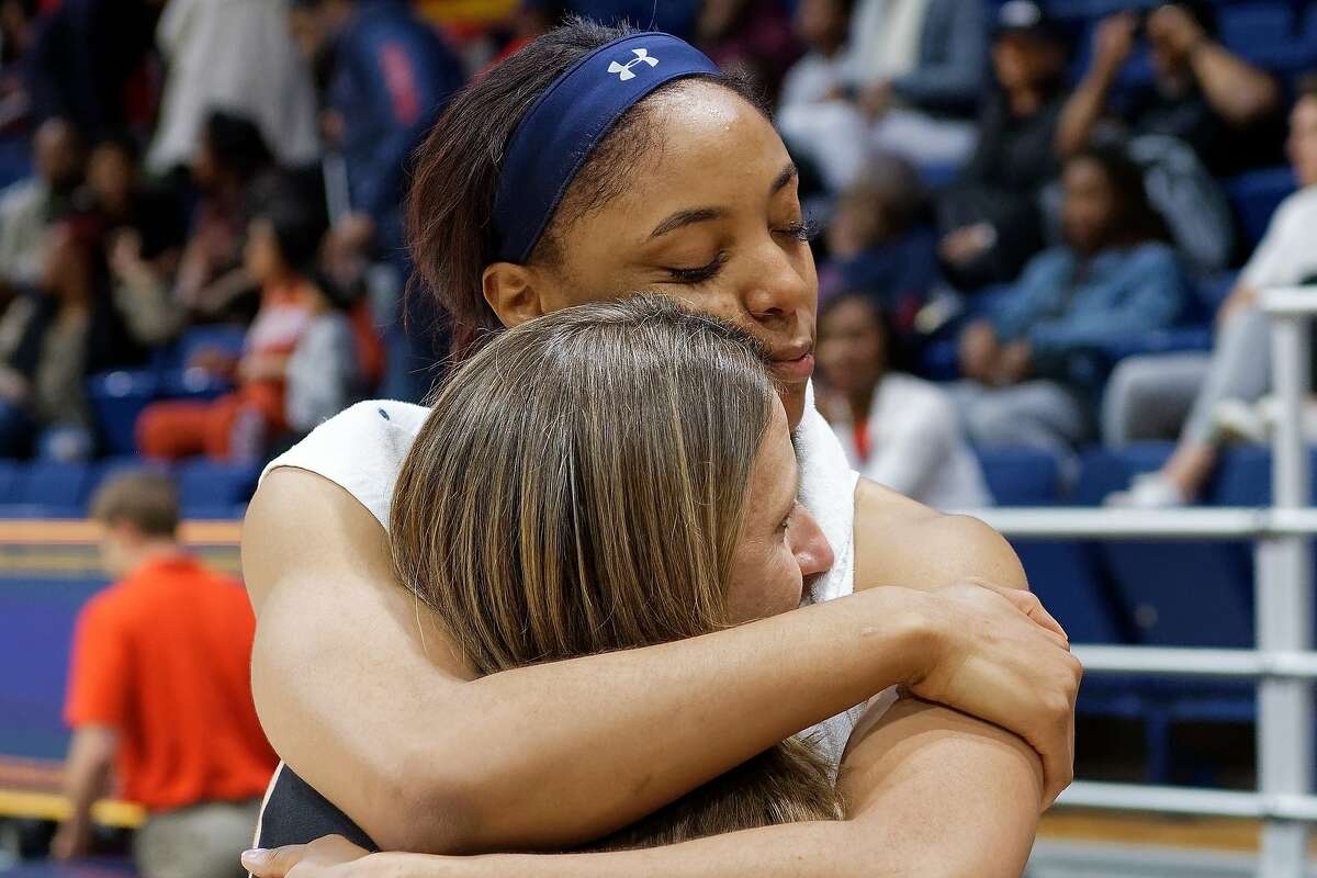 Cal center Kristine Anigwe embraces head coach Lindsay Gottlieb in the senior's final game at Haas Pavilion.