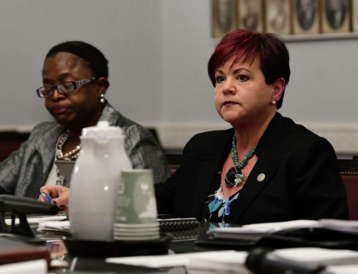 Schenectady City Council members Marion Porterfield, left, and Leesa Perazzo listen as the Schenectady City Council takes the first step in overriding Mayor Gary McCarthy's rejection of their plan to keep four city court judges in the city at City Hall on Monday, March 4, 2019 in Schenectady, N.Y. (Lori Van Buren/Times Union)