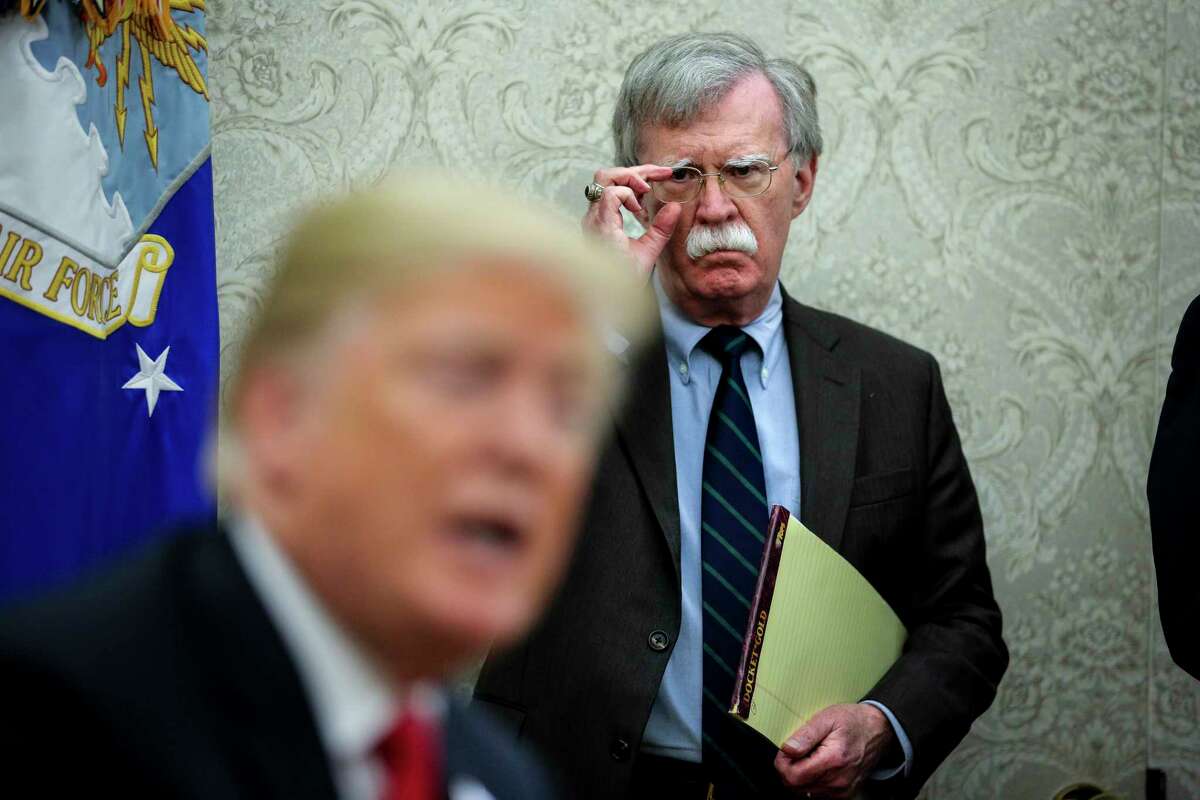 National security adviser John Bolton, shown in September, keeps close to the president.