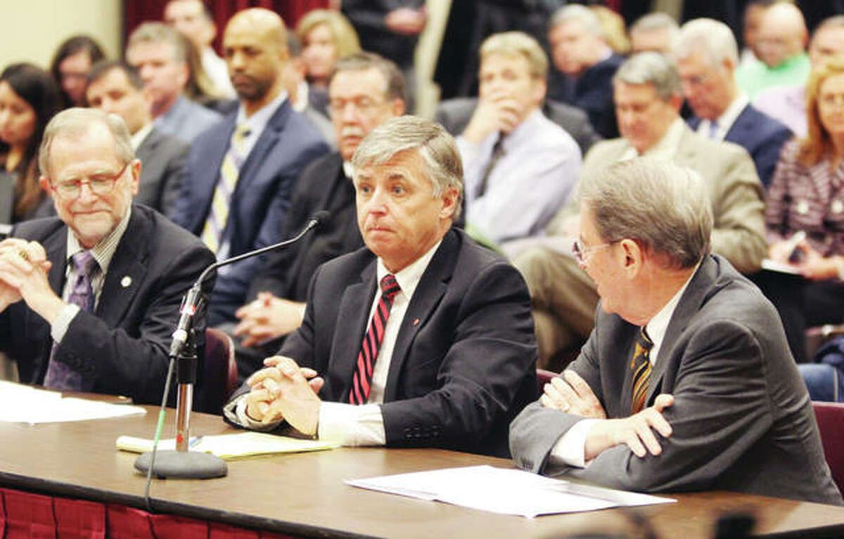 SIUE Chancellor Randy Pembrook, center, flanked by SIU System President Kevin Dorsey, right, and SIUC Chancellor John Dunn, testifies about higher education capital funding needs during a joint public hearing of the Illinois Senate’s Transportation and Appropriations II committees on a possible capital improvement bill Monday at SIUE. The hearing was the second of six statewide hearings set on the proposal.