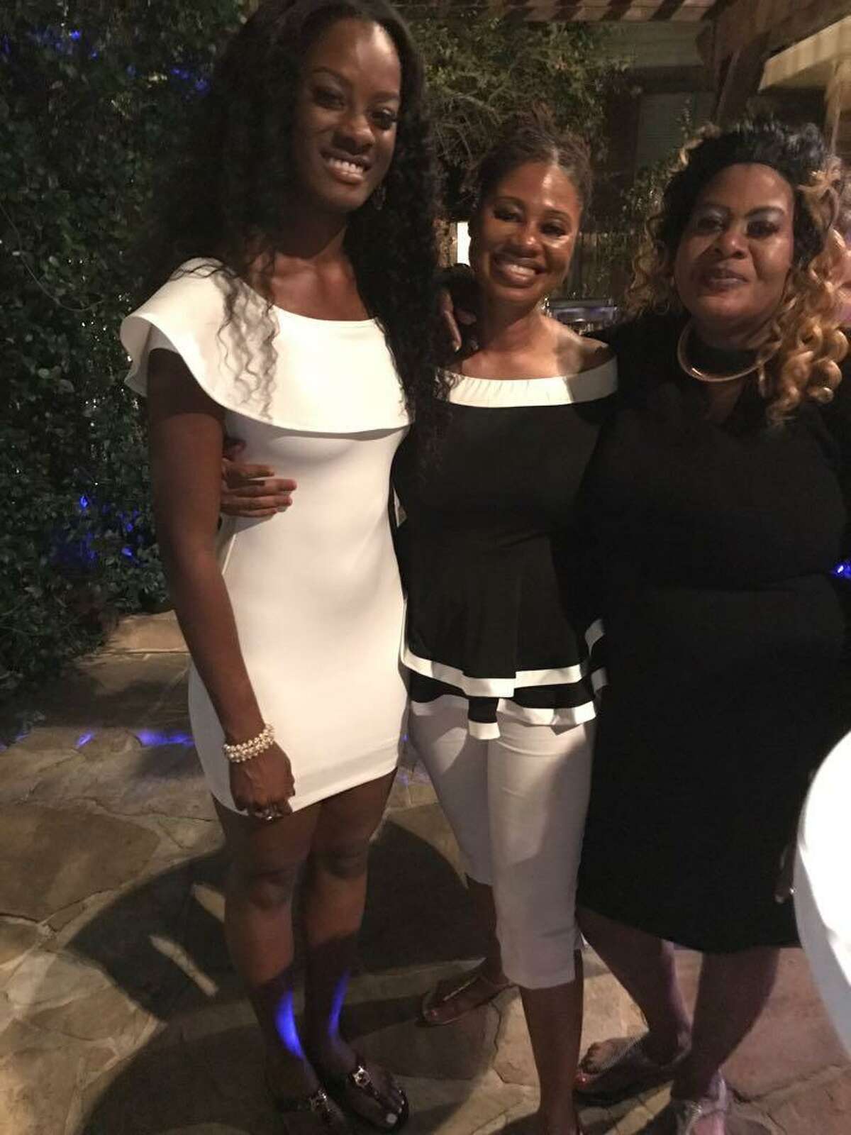 Andreen Mcdonald, left to right, poses with her sister,  Cindy Ann Johnson, and their mother,  Hyacinth Smith, celebrating Andreen's birthday in 2017. McDonald went missing Friday, March 1, 2019, and is feared dead. A search for her body Sunday and Monday didn't yield results; the search continues Tuesday, March 5.