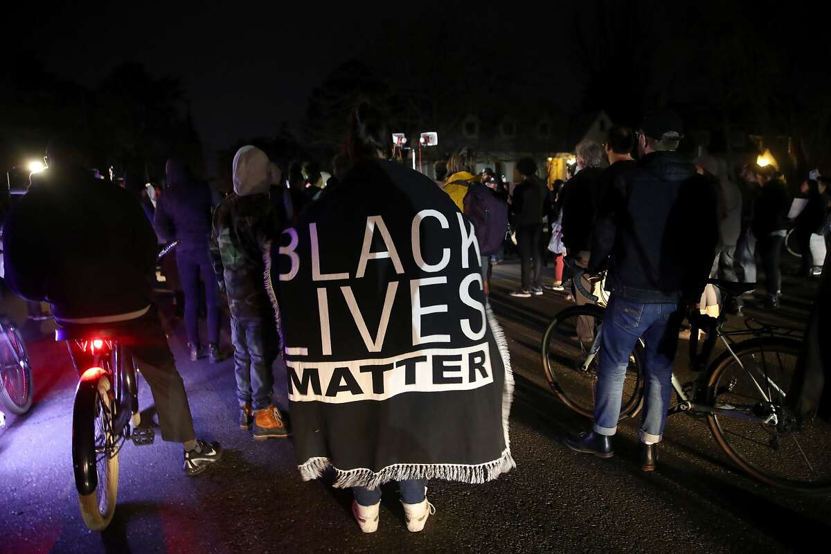 SACRAMENTO, CALIFORNIA - MARCH 04: Black Lives Matter protesters march through the streets as they demonstrate the decision by Sacramento District Attorney to not charge the Sacramento police officers who shot and killed Stephon Clark last year on March 04, 2019 in Sacramento, California. Dozens of Black Lives Matter protesters demonstrated against the decision by Sacramento District Attorney Anne Marie Schubert to not charge two police officers who shot and killed Stephon Clark, an unarmed black man. (Photo by Justin Sullivan/Getty Images)