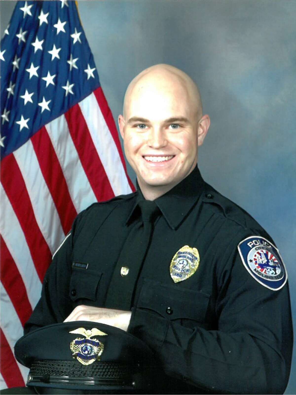 Midland Police Department Officer Nathan Heidelberg died this after being shot while responding to an alarm at a local residence, according to the city’s spokesman.