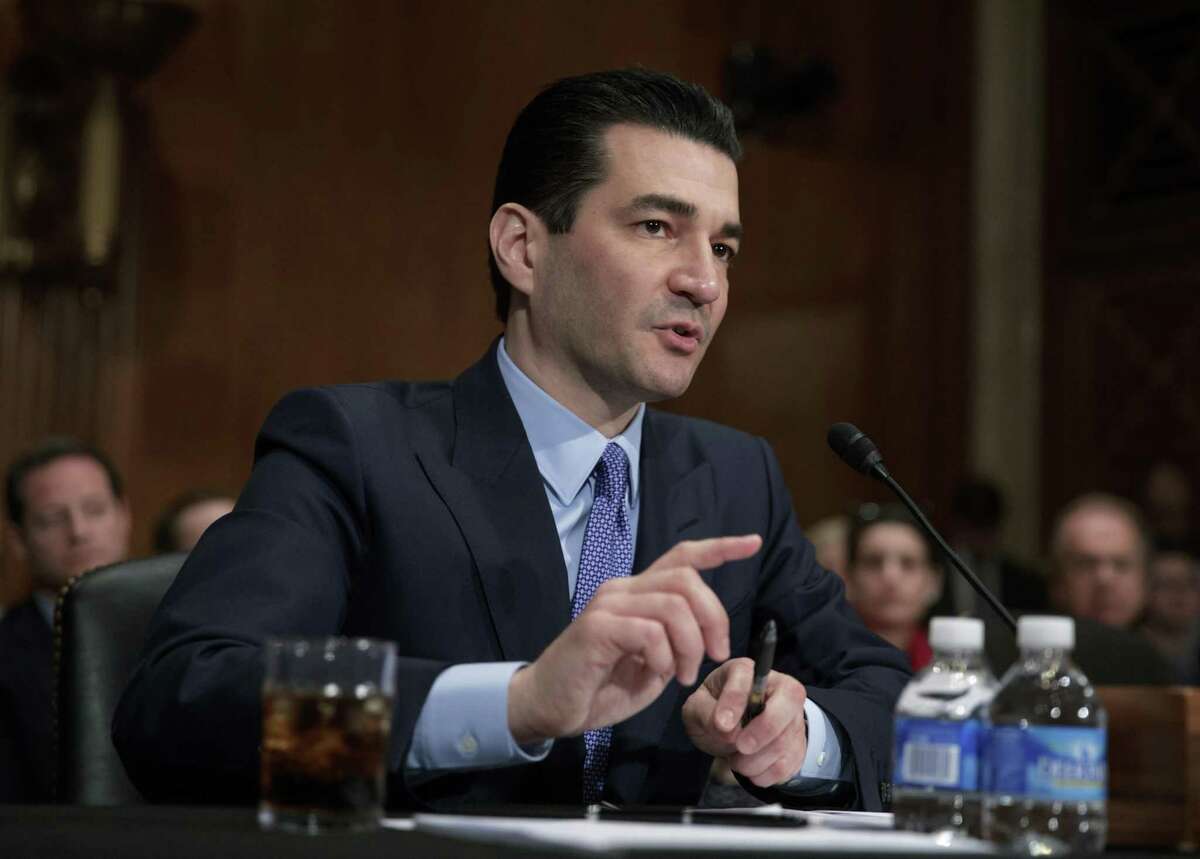 FILE - In this April 5, 2017, file photo, Dr. Scott Gottlieb speaks during his confirmation hearing before a Senate committee, in Washington, as President Donald Trump's nominee to head the Food and Drug Administration. The Food and Drug Administration Commissioner is stepping down after nearly two years leading the agency. Health and Human Services Secretary Alex Azar announced Gottlieb's plan resignation in a statement Tuesday, March 5, 2019. (AP Photo/J. Scott Applewhite, File)