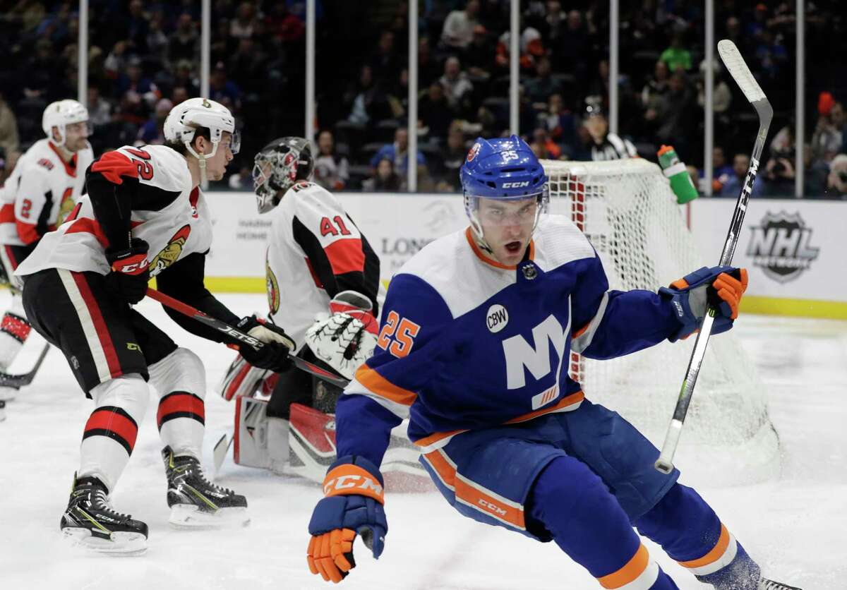New York Islanders defenseman Devon Toews (25) reacts after scoring a goal on Ottawa Senators goaltender Craig Anderson (41) during the second period of an NHL hockey game Tuesday, March 5, 2019, in Uniondale, N.Y. (AP Photo/Kathy Willens)