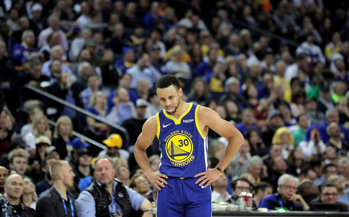 Stephen Curry (30) reacts after a call went against the Warriors in the first half as the Golden State Warriors played the Boston Celtics at Oracle Arena in Oakland, Calif., on Tuesday, March 5, 2019.