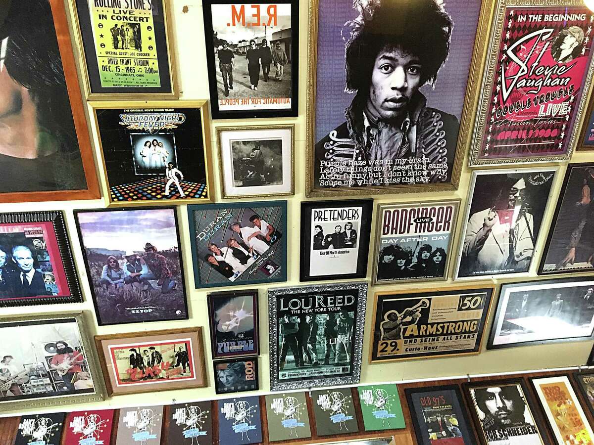 Music posters line the walls and ceiling of Sam's Burger Joint.