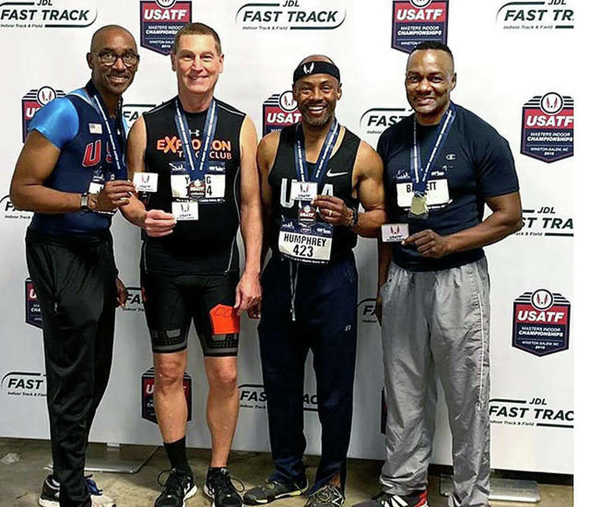 Wood River’s Mike Young, second from left, and the other members of the 4x200 relay men’s 55-59 USATF Masters National Champions after receiving their gold medals at the Masters USATF National Championships in Winston-Salem, North Carolina. From left: Michael D. Jones, Young, Ronald Humphrey and Owen Barrett.