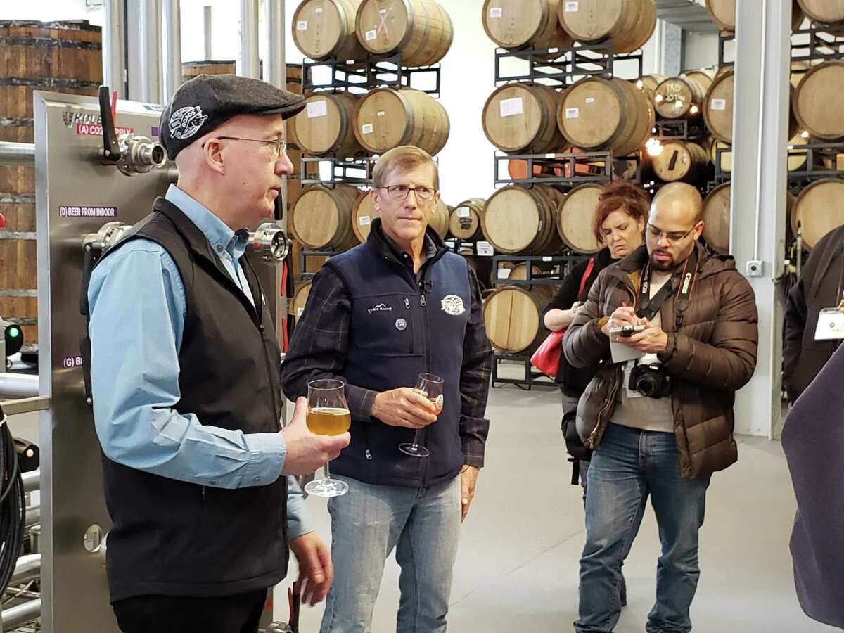 Master brewer Phil Markowski (in hat) talks about the brand new brewery, Area Two Experimental Brewing in Stratford.