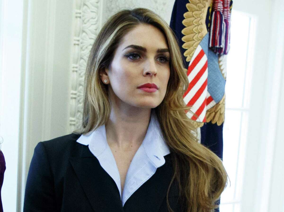 In this Feb. 9, 2018 photo, Hope Hicks appears in the Oval Office at the White House in Washington.