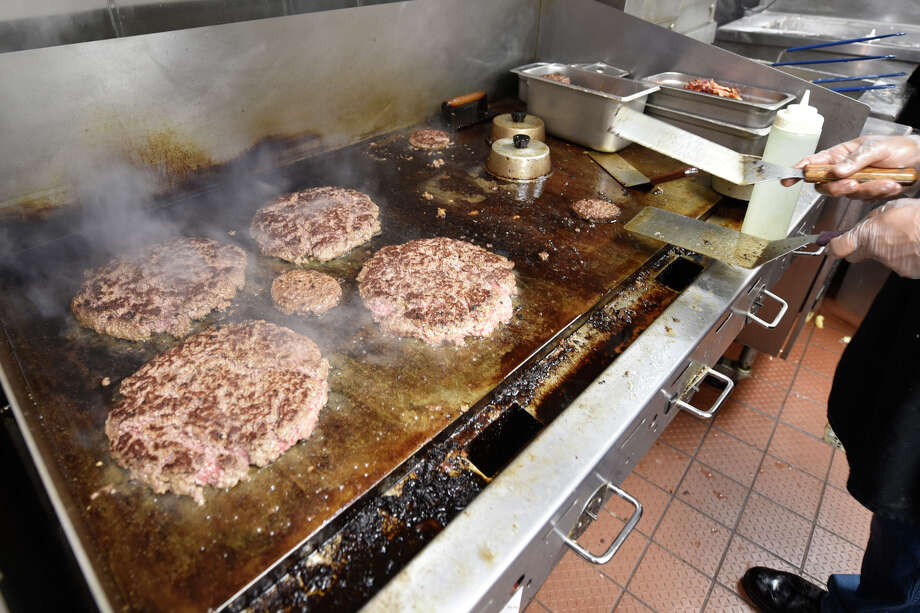 Photos: Fuddruckers three-pound burger challenge - Houston Chronicle