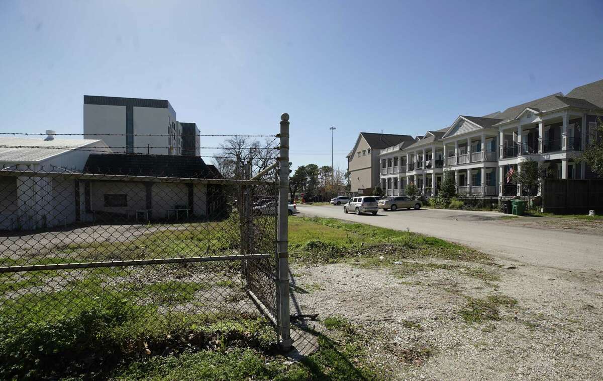 The property at 402 Columbia, left, is the site where a developer is proposing an affordable housing complex shown Wednesday, Feb. 13, 2019, in Houston.