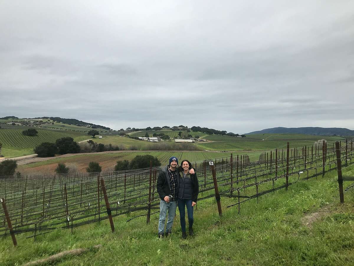 Winemakers Mikey Giugni and Gina Hildebrand in the Chene Vineyard in Edna Valley.