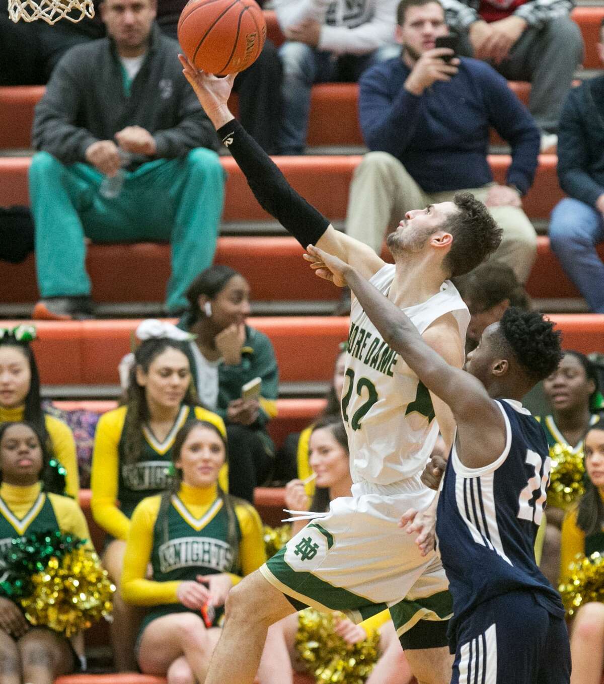 (John Vanacore/For Hearst Connecicut Media) The Notre Dame Green Knights and Hillhouse Academics traveled to Shelton High School for the 2nd Round of the CIAC Division 1 basketball tournament Wednesday night. Notre Dame advances to the Quarterfinals with their 57-36 win.