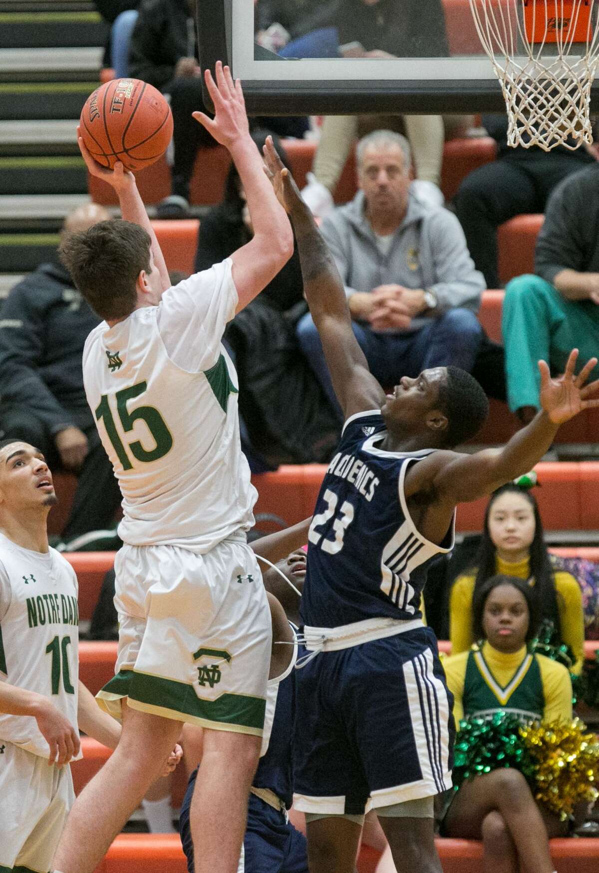 (John Vanacore/For Hearst Connecicut Media) The Notre Dame Green Knights and Hillhouse Academics traveled to Shelton High School for the 2nd Round of the CIAC Division 1 basketball tournament Wednesday night. Notre Dame advances to the Quarterfinals with their 57-36 win.