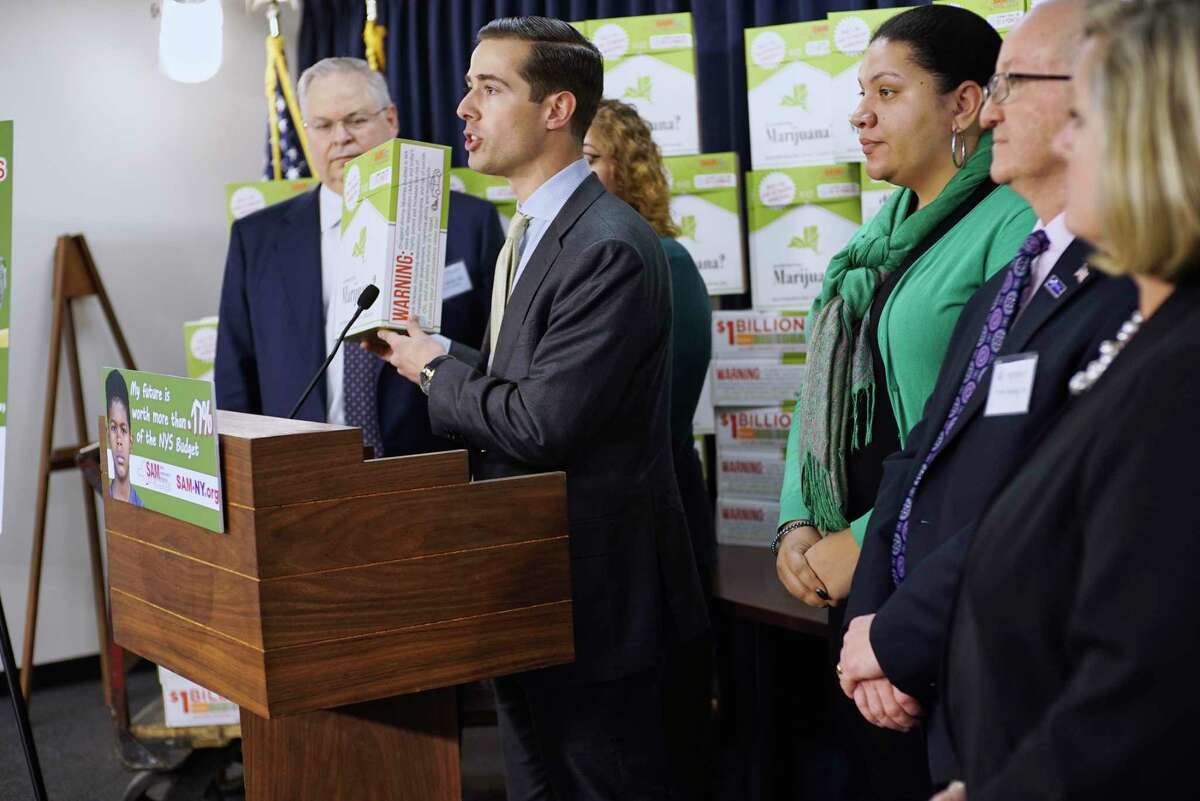 Luke Niforatos, a senior policy advisor and chief of staff for Smart Approaches to Marijuana New York, addresses those gathered for a press event at the Legislative Office Building on Wednesday, March 6, 2019, in Albany, N.Y. The event was held by people who were calling on legislators to slow down their rush to legalize marijuana and to study the issue more. Following the event people with the organization handed out to legislators "Pot Packs" which along with information had examples of the kind of products that are being sold in other states where the drug has been legalized. (Paul Buckowski/Times Union)
