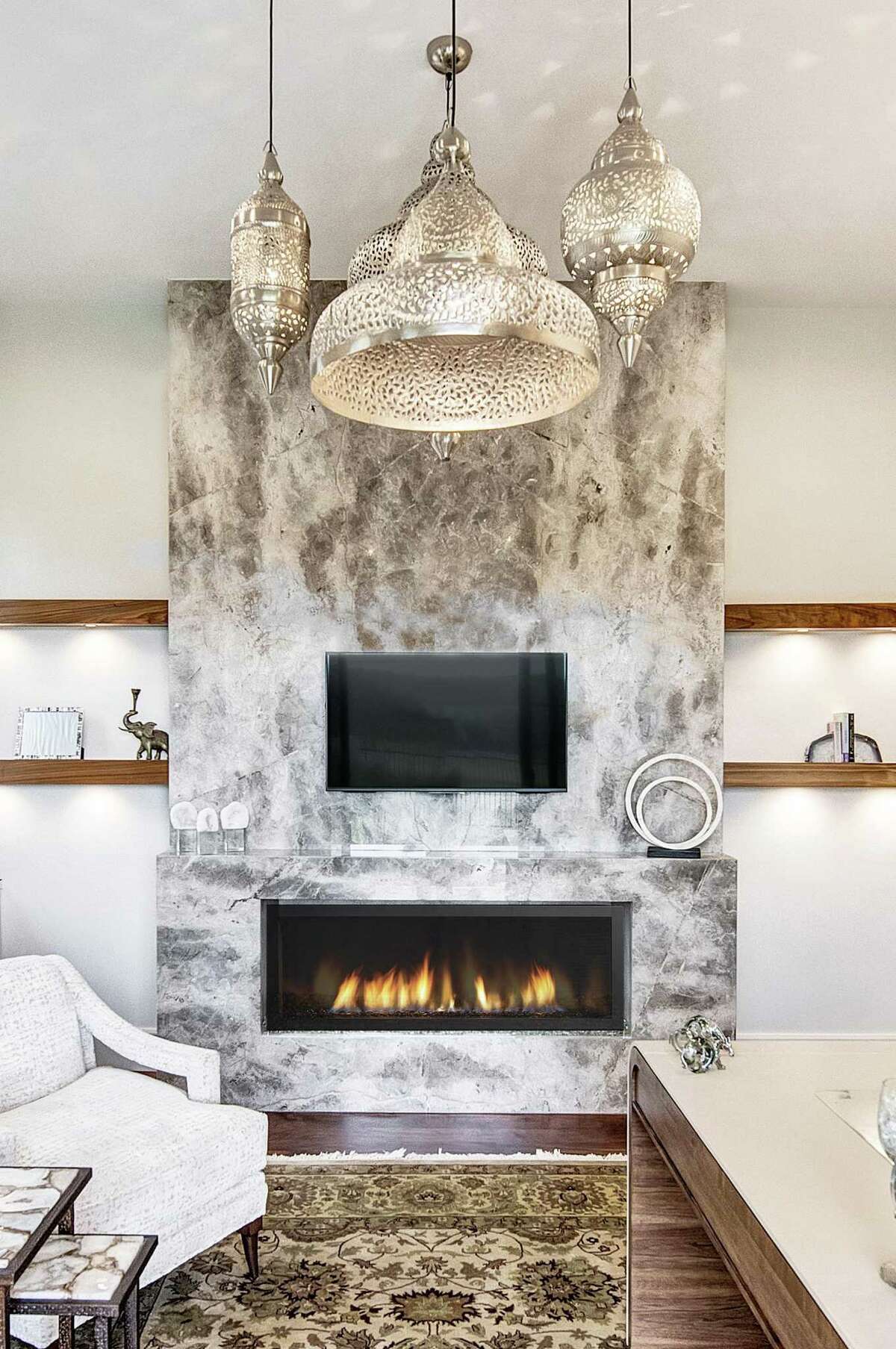 Fior de Bosco marble from Aria Stone Gallery was used around this fireplace.