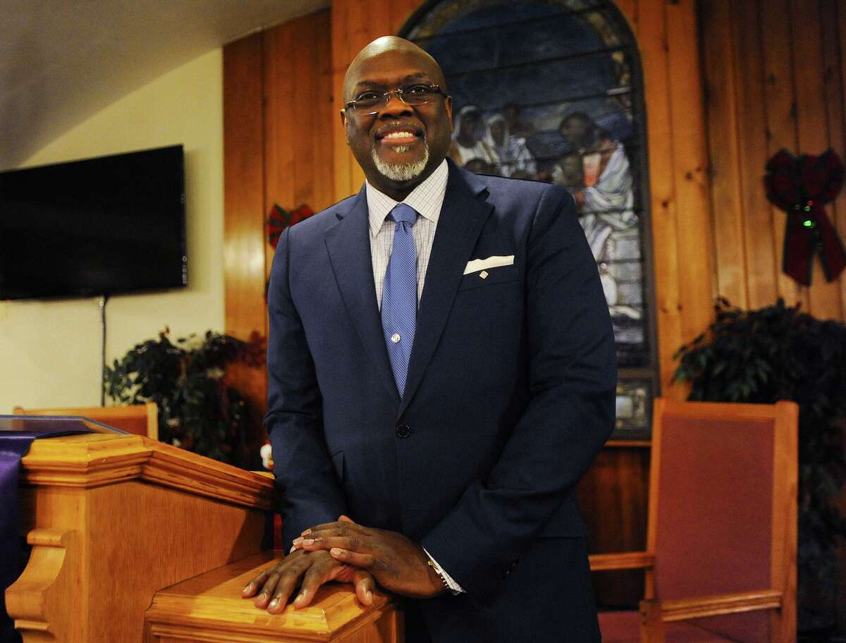 Reverend and State Rep. Charles Stallworth stands at the pulpit of his church, East End Tabernacle Baptist, in Bridgeport, Conn. on Tuesday, December 18, 2018. Stallworth is contemplating running for Bridgeport mayor. Current Mayor Joe Ganim issued his public apology from the East End Baptist pulpit before his successful reelection in 2015.