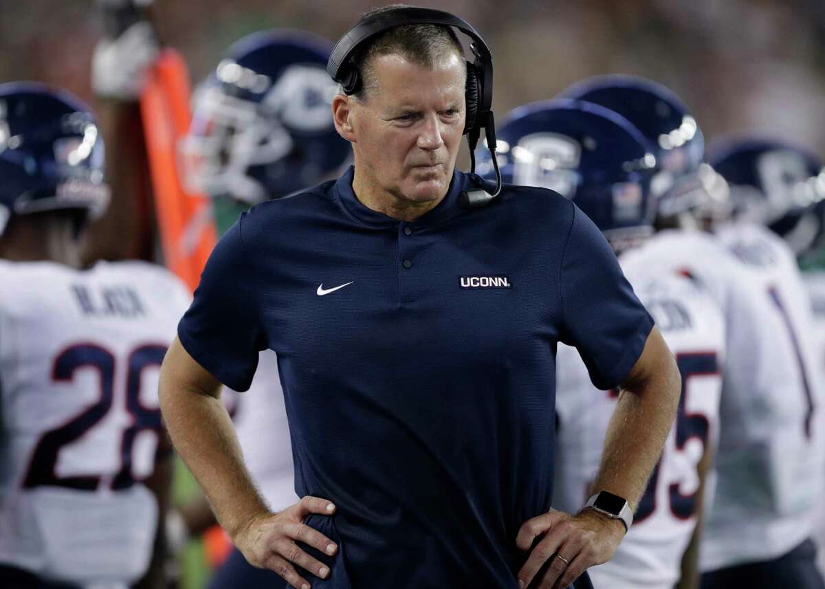 UConn coach Randy Edsall walks the sideline during a game against South Florida on Oct. 20, 2018, in Tampa, Fla.