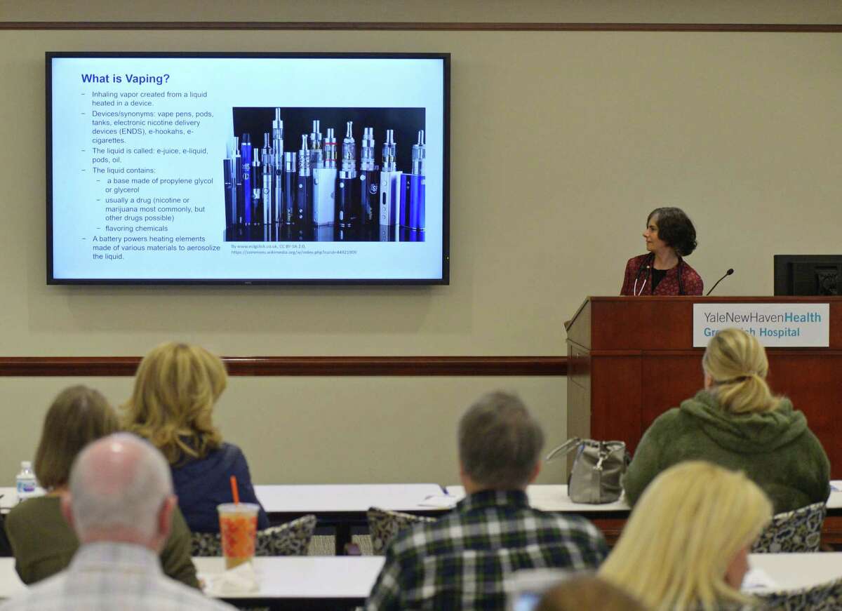 Pulmonologist Alissa Greenberg, MD, presents "Vaping & Juuling: What are the Consequences?" at Greenwich Hospital in Greenwich, Conn. Tuesday, March 5, 2019. Pulmonologist Alissa Greenberg, MD, and Psychiatrist Jeremy Barowsky, MD, delivered a presentation on vaping and Juuling, particularly in adolescents, as well as the short-term and long-term developmental effects of nicotine dependence. Though it is generally agreed that vaping is not as dangerous as smoking cigarettes, the long-term effects are largely unknown and the trend of middle school- and high school-aged children vaping has many doctors worried.
