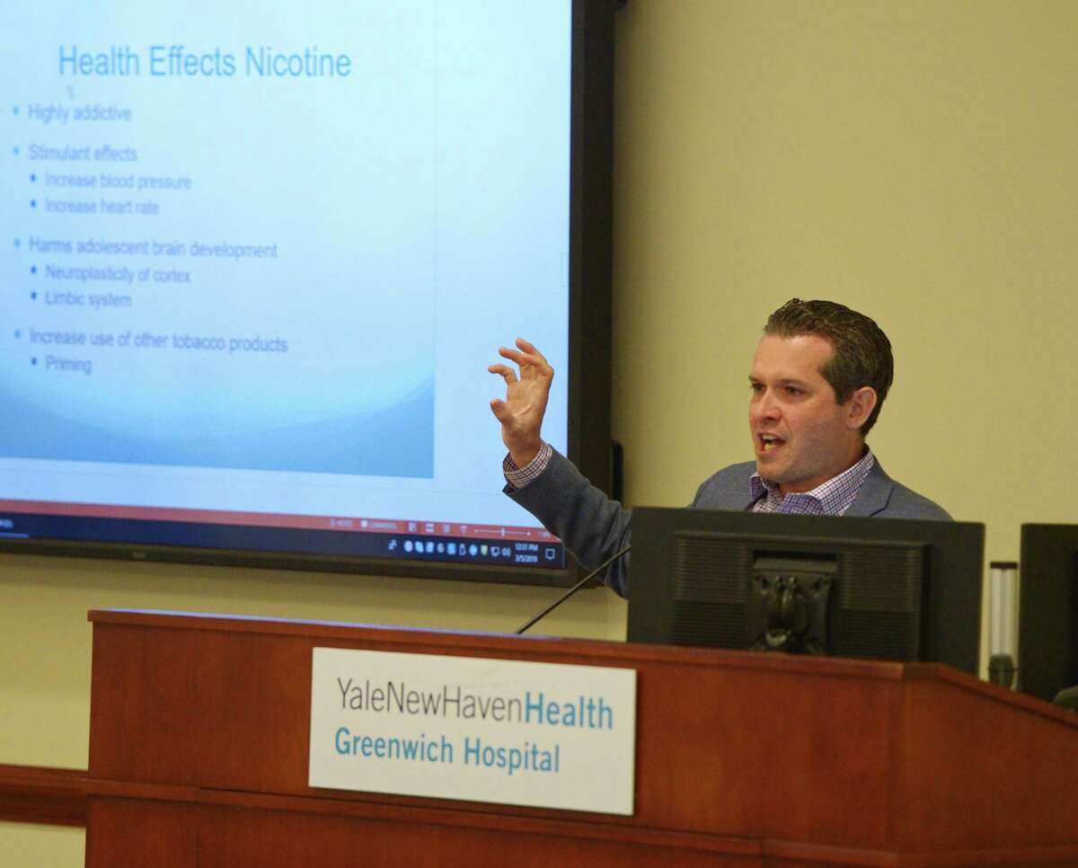 Psychiatrist Jeremy Barowsky, MD, presents "Vaping & Juuling: What are the Consequences?" at Greenwich Hospital in Greenwich, Conn. Tuesday, March 5, 2019. Pulmonologist Alissa Greenberg, MD, and Psychiatrist Jeremy Barowsky, MD, delivered a presentation on vaping and Juuling, particularly in adolescents, as well as the short-term and long-term developmental effects of nicotine dependence. Though it is generally agreed that vaping is not as dangerous as smoking cigarettes, the long-term effects are largely unknown and the trend of middle school- and high school-aged children vaping has many doctors worried.