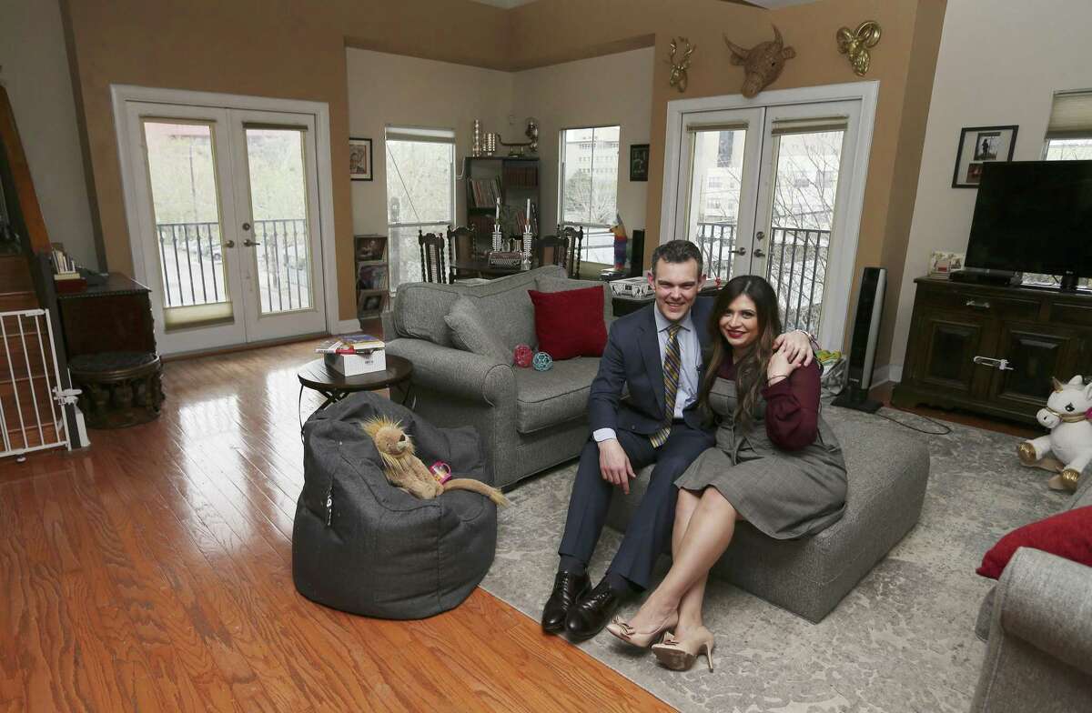 Attorney T.J. Mayes and his wife, Laura Elizabeth, rent their home in downtown San Antonio. They enjoy the amenities and conveniences that downtown living provides but are undecided if they will stay after their lease ends or opt to move to a more traditional residential community. (Kin Man Hui/San Antonio Express-News)