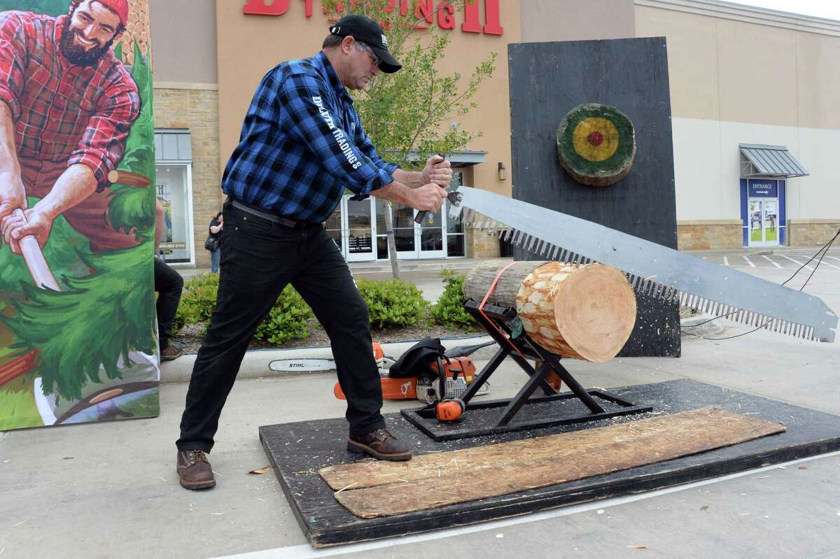 Dave Weatherhead prepares for a lumberjack demonstration during the grand opening of Duluth Trading in Katy, TX on Friday, March 8, 2019.
