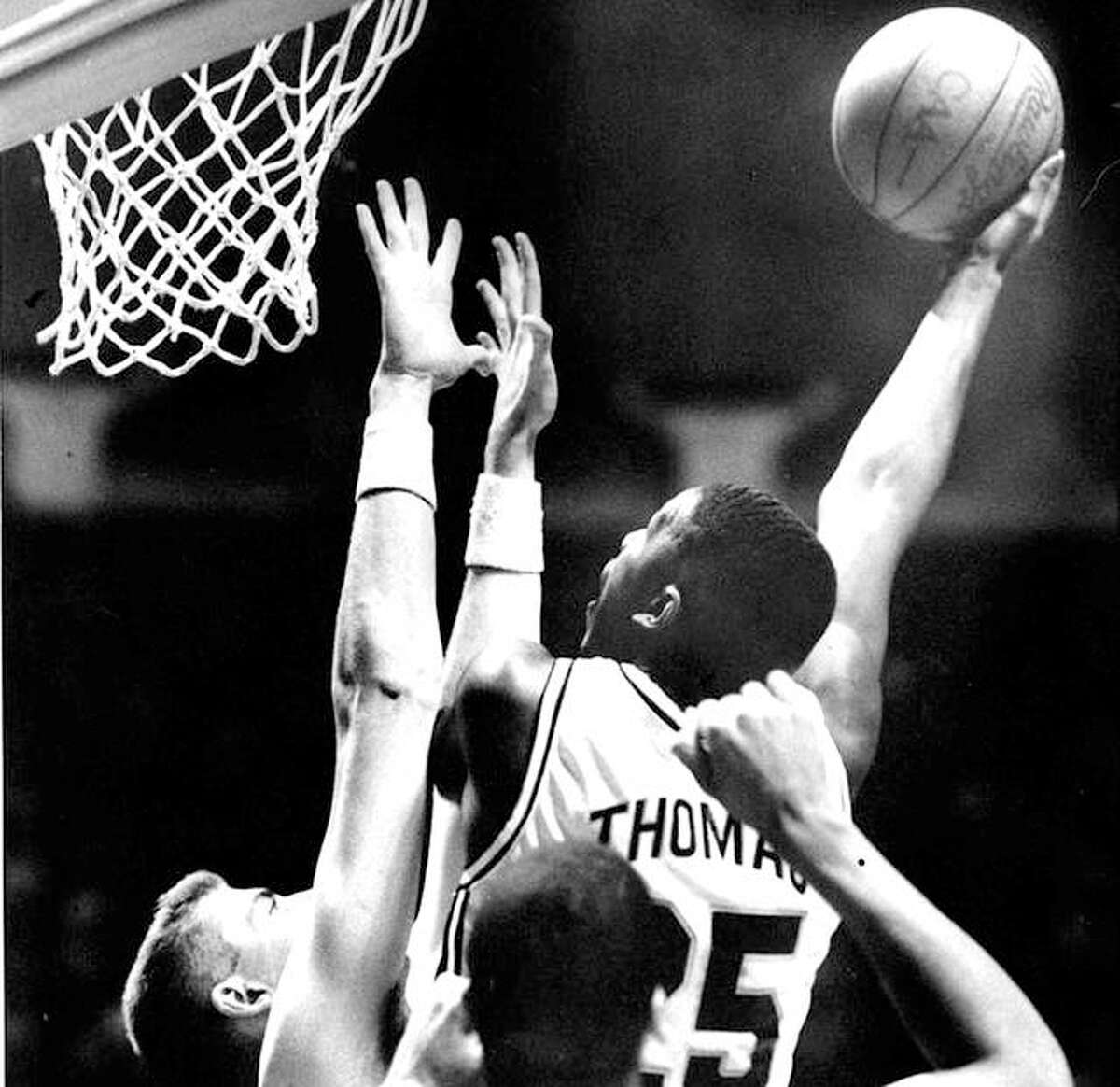Former Illinois standout Deon Thomas puts up a shot during his playing days in Champaign. Thomas, who later was the athletic director and men’s basketball coach at Lewis and Clark Community College, will be inducted into the Illini Hall of Fame this year.