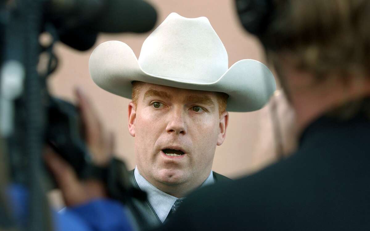 Texas Ranger Shawn Palmer, lead investigator in the Susan McFarland murder case, talks to the media after Richard McFarland, a suspect in the death of his wife, Susan McFarland, appeared before state District Judge Sid Harle in 2002.