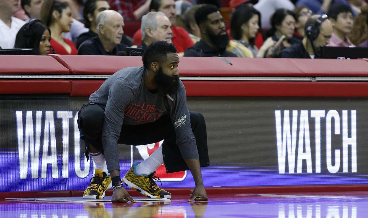 Houston Rockets guard James Harden gets ready to go into the game against the Philadelphia 76ers during the second half of an NBA basketball game at Toyota Center on Friday, March 8, 2019, in Houston.