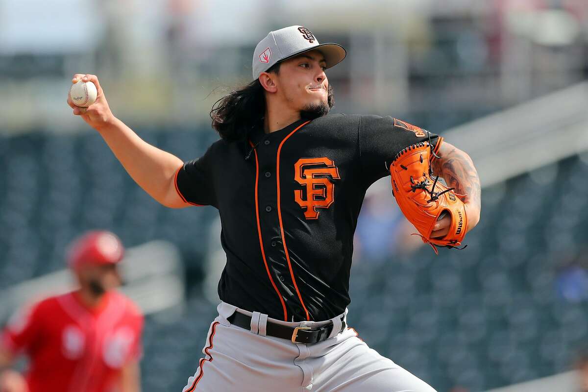 GOODYEAR, AZ - FEBRUARY 26: Dereck Rodriguez #57 of the San Francisco Giants pitches during a Spring Training game against the Cincinnati Reds on Tuesday, February 26, 2019 at Goodyear Ballpark in Goodyear, Arizona. (Photo by Alex Trautwig/MLB Photos via Getty Images)