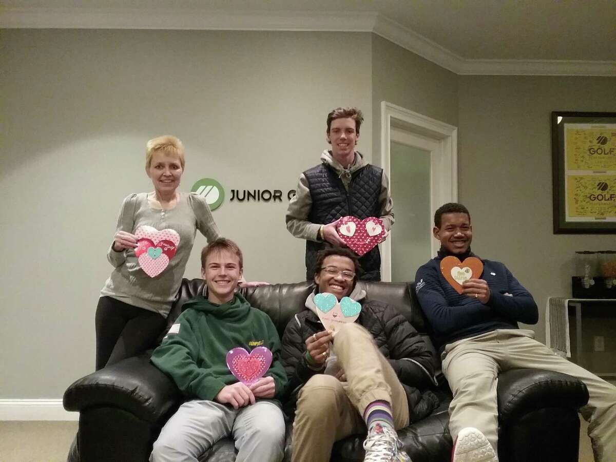 Students at at Ethan Allen Preparatory in Ridgefield recently made Valentine's cards and collected toiletries to donate to the Women's Center of Greater Danbury. Top row, left to right: Pamela Brown, Advisor; Michael Donnelly; Bottom row, left to right: James Farina; G. Edward Bell, Rian King