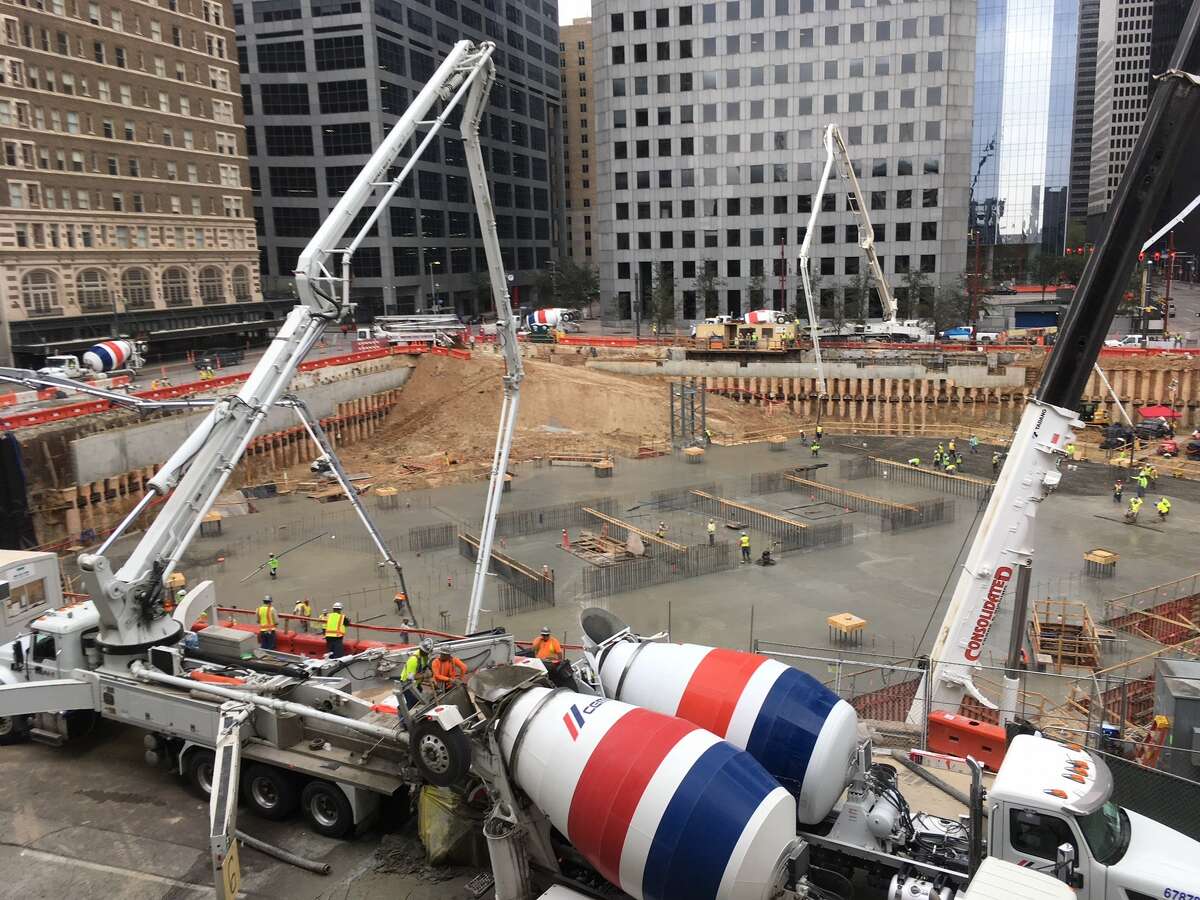 Concrete fills the foundation at Texas Tower on Sunday, March 10, 2019, in downtown Houston. Concrete trucks were unloaded every 45 seconds for 20 hours for the mat foundation for the building, which will rise more than 700 feet tall.