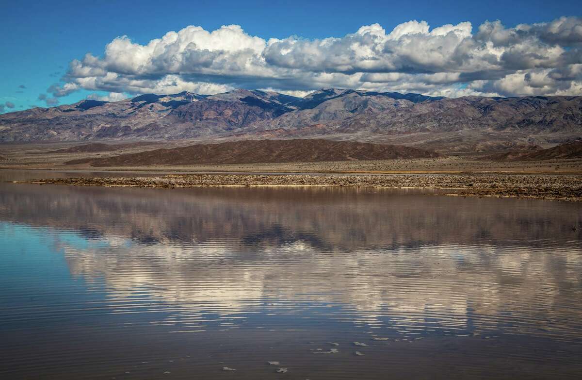 Rare 10milelong lake forms in Death Valley after heavy rains and flooding