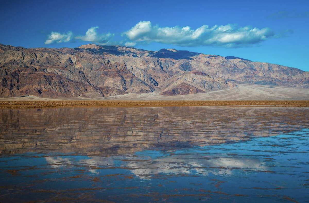 Rare 10milelong lake forms in Death Valley after heavy rains and flooding