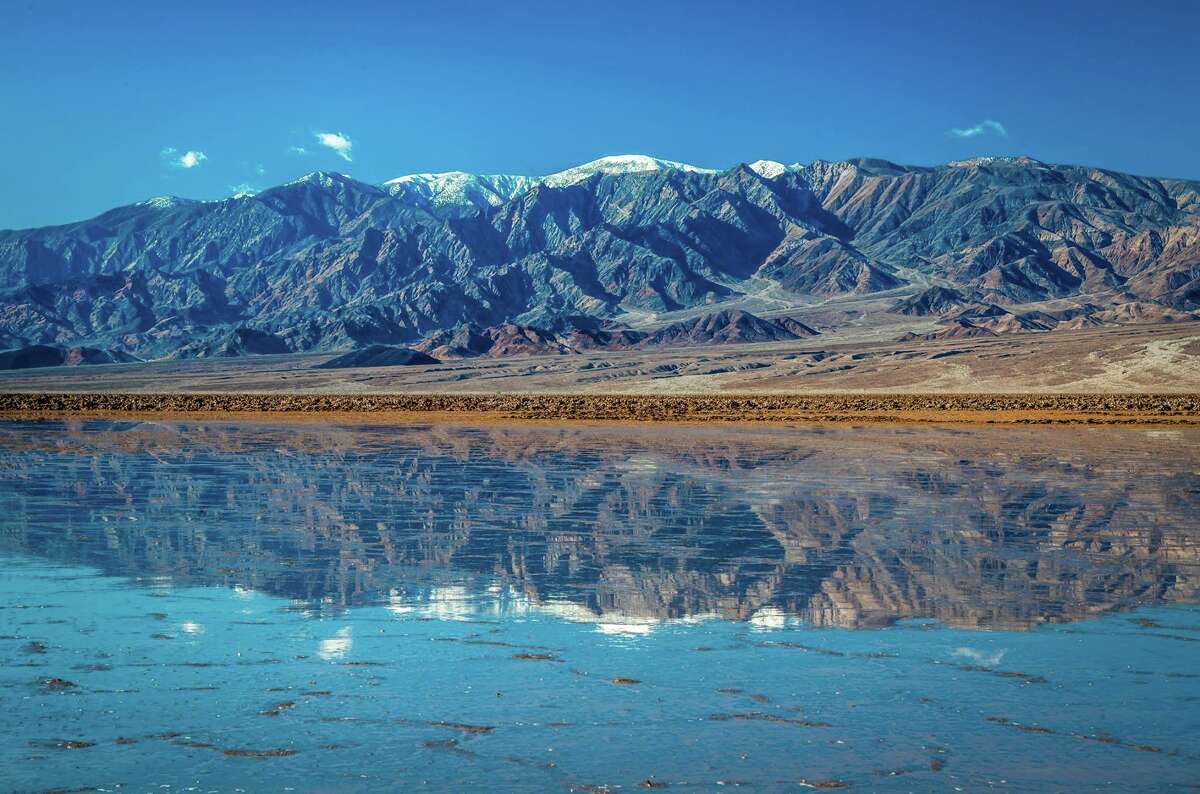 Rare 10-mile-long lake forms in Death Valley after heavy ...