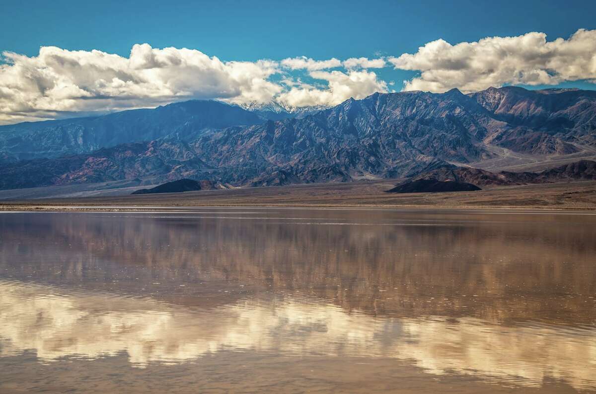 Rare 10milelong lake forms in Death Valley after heavy rains and flooding
