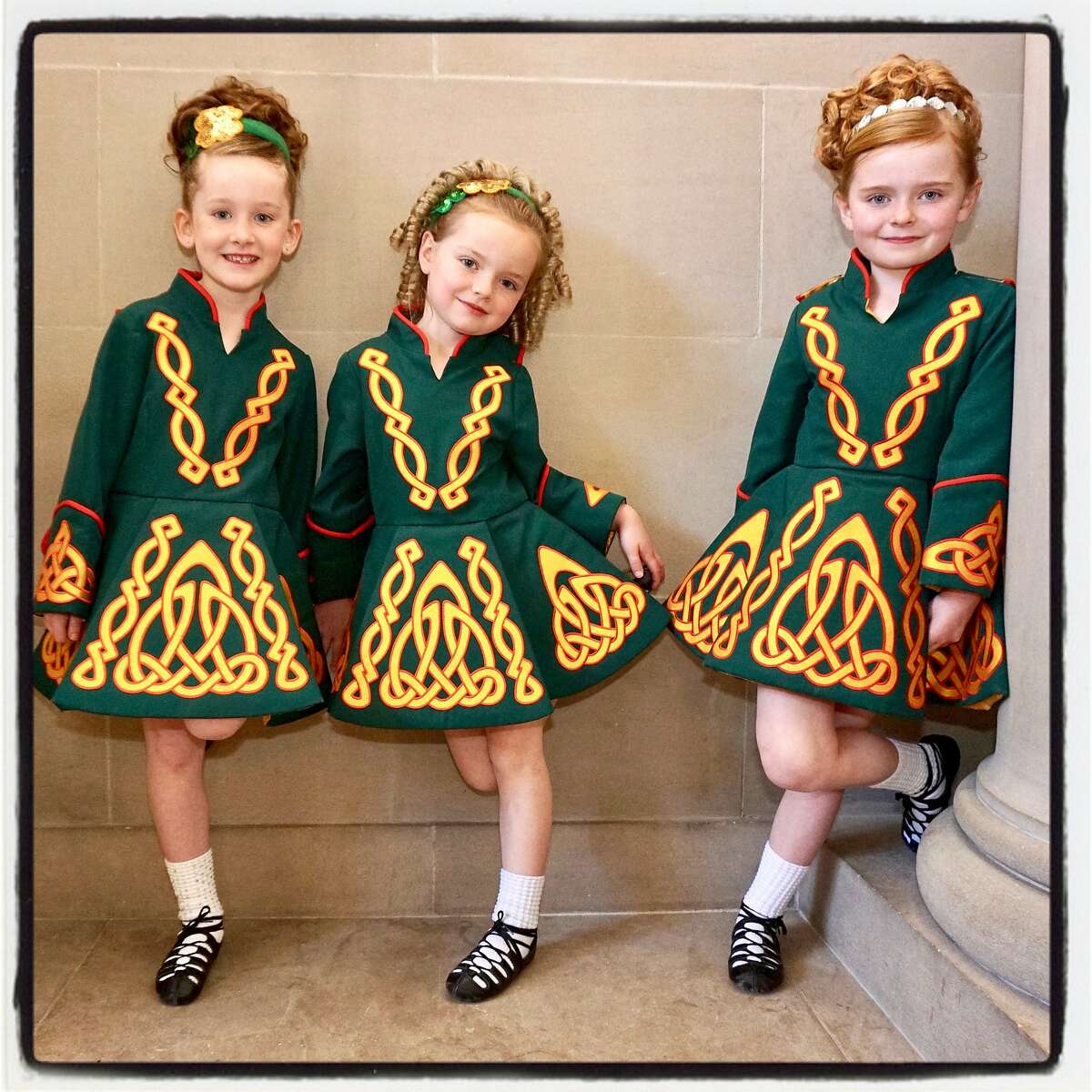 Murphy Irish Dancers (from left) Molly Spillane, Grace Devlin and her sister Neve Devlin at City Hall. March 8, 2019.