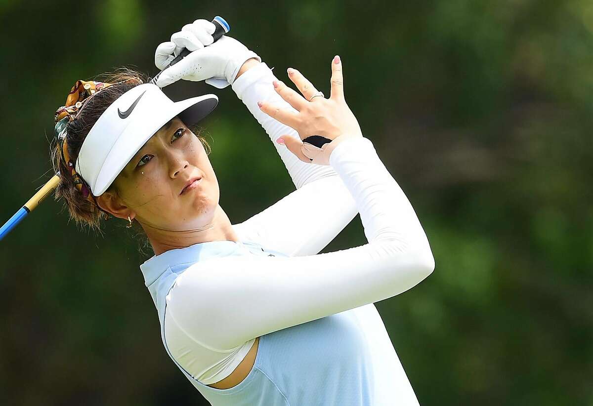 SINGAPORE, SINGAPORE - FEBRUARY 28: Michelle Wie of United States plays her shot from the 14th tee during the first round of the HSBC Women's World Championship at Sentosa Golf Club on February 28, 2019 in Singapore. (Photo by Ross Kinnaird/Getty Images)