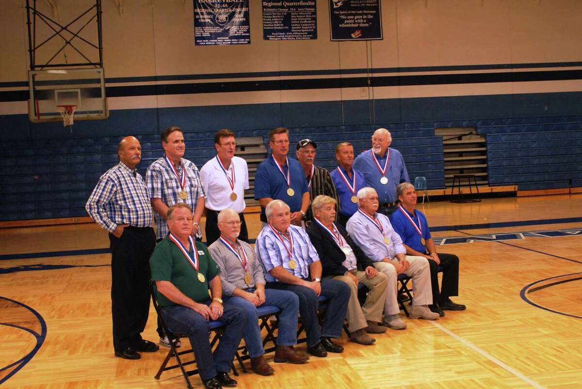 Friendswood's 1969 Class A state basketball champions gathered in 2011 as inductees into the Friendswood High School Sports Hall of Honor. Coach Walter Wilson, back row on the left, was joined by team members. Those inducted Wilson, Kent Ballard, Byron Cline, Perry Davis, Bill Holbrook, Arthur Kahn, Kevin Kelledy, Tom Long, Don Reed, Harley Robinson, Richard Stapp (posthumously), Wyatt Tompkins, Kenneth Toon, Rodney Unruh, and Mike Worden. Other coaches were Danny Pollard and Don Hamilton.