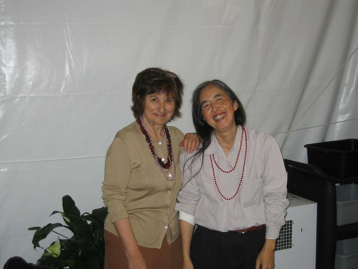 Janice Higashi (right) poses for a photo with retired San Francisco Chronicle reporter Marian Zaillian in 2007. Higashi died Sunday, five days after being struck by a car in San Francisco's Tenderloin neighborhood, her friends said.